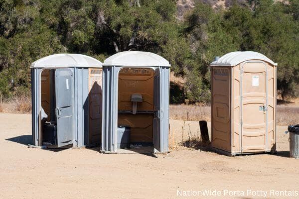 a clean row of portable restrooms for outdoor weddings or festivals in Pekin, IL